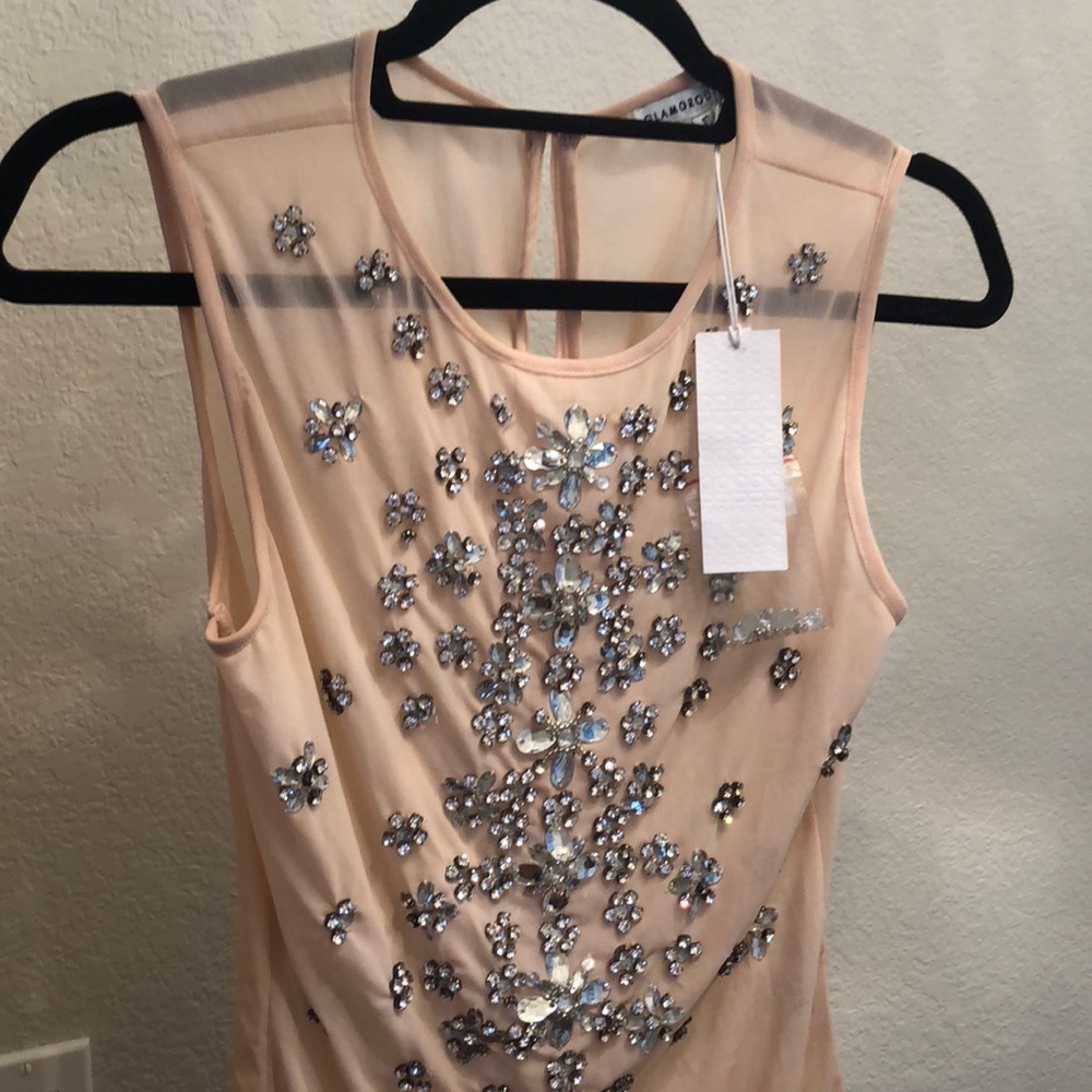 Jeweled bodysuit.